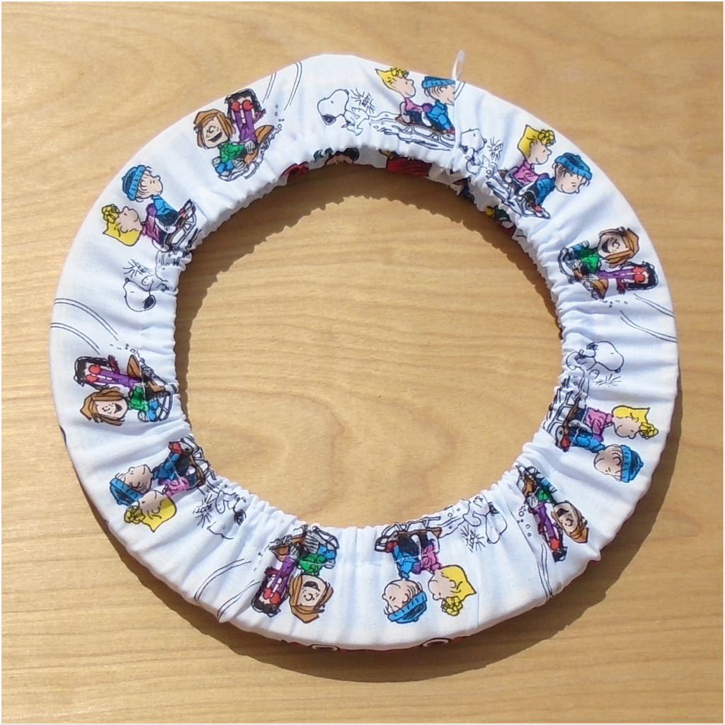 Hoop Huggie Grime Guard made from Peanuts Sledding Fabric